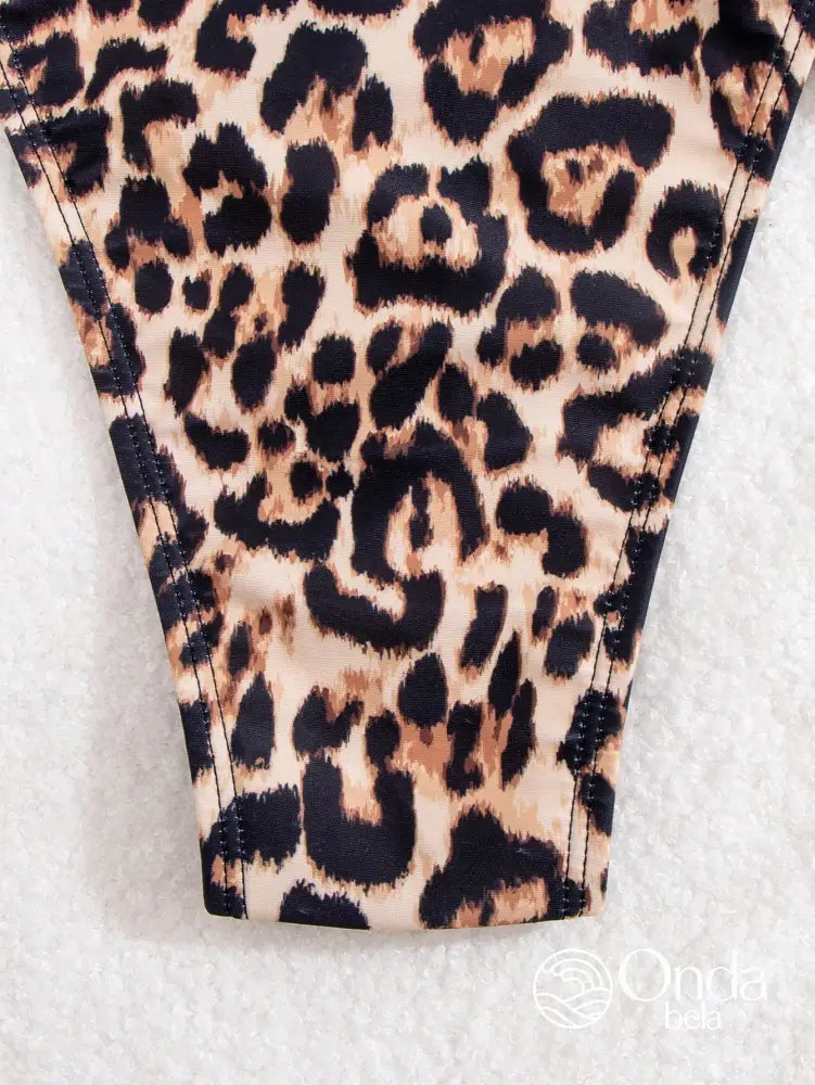 Maiô Animal Print Decote Profundo Com Cinto Faixa Maiô Animal Print Decote Profundo Com Cinto Faixa